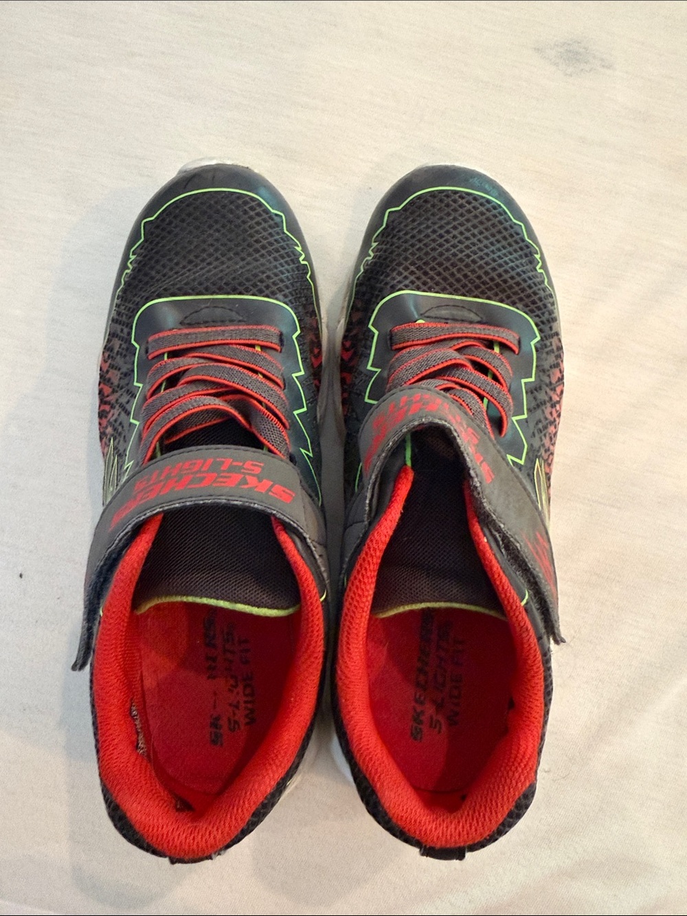 Skechers Black Sneakers with Red and Neon Green Accents